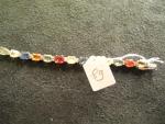 Bracelet ligne en or gris 14K orné de saphirs multicolores...