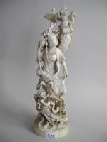 JAPON - OKIMONO en ivoire représentant une divinité féminine. Période...