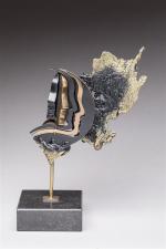 Alain Cantarel (né en 1949)
" Visages "
Sculpture en bronze doré...