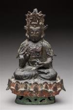 STATUETTE en bronze à patine brune laqué représentant Avalokiteshvara faisant...