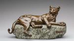 Charles VALTON (1861-1918). " Lionne couchée sur un rocher "....