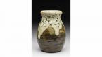 Paul JEANNENEY (1861-1920). Vase de forme bombée en grès brun...