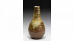 Paul JEANNENEY (1861-1920). Vase piriforme en grès à coulées brun...