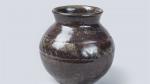 Eugène LION (1867-1945). Vase de forme boule à col ouvert...