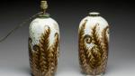 THARAUD. Paire de vases de forme bombée en porcelaine à...