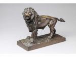 Jules Moigniez (1835-1894) d'après. " Lion marchant ". Bronze à