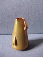 Massier
Petit vase de forme conique en céramique irisée à gouttelettes...