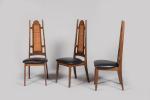 Ecole américaine
Série de six chaises en bois clair à hauts...