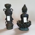 Deux STATUETTES en cuivre représentant un Bouddha assis sur un...