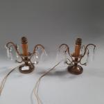 Une paire de LAMPES en bronze et cristal. 
Style Louis...