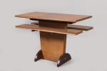 André Sornay (1902-2000)
Console table d'appoint en bois clair clouté à...