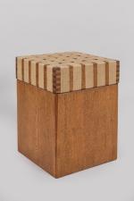 André Sornay (1902-2000)
Un tabouret en bois clair clouté de forme...