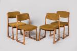 Années 1960
Série de quatre chaises à structure en bois teinté...