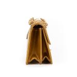 CHANEL - SAC modèle "Timeless" en cuir verni gold, chaine...