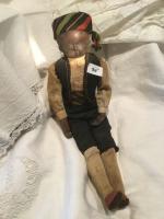 Rare poupée bois noir représentant un ramoneur savoyard, tête crâne...