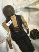 Rare poupée bois noir représentant un ramoneur savoyard, tête crâne...