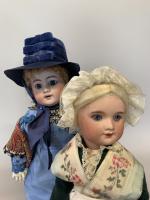 2 poupées,
-Orlanne belle poupée tête biscuit « 7 » blonde...