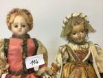 2 poupées, 
-Nasthasia 29 cm, tête buste et membres matériau...