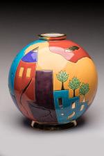 Longwy
Vase de forme boule en céramique à émaux polychromes modèle...