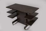 André Sornay (1902-2000)
Table roulante à système en pin d'Oregon clouté....