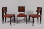 André Sornay (1902-2000)
Série de six chaises en palissandre clouté à...
