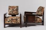 André Sornay (1902-2000)
Paire de fauteuils de salon palissandre clouté et...