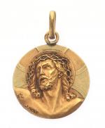 PENDENTIF "Christ à la couronne d'épine" en or jaune 750/°°...