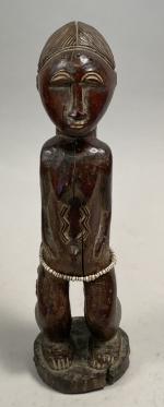 CÔTE d'IVOIRE. Statuette Baoulé en bois à patine brun foncé,...