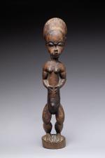 CÔTE d'IVOIRE. Statuette Baoulé en bois à patine brune nuancée,...