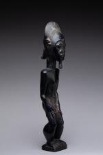 CÔTE d'IVOIRE. Statuette Baoulé, en bois à patine noire. H....