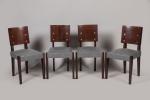 André Sornay (1902-2000)Série de huit chaises en acajou clouté à...