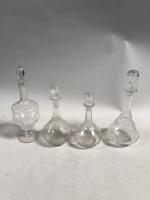 Quatre CARAFES en cristal et verre. Epoque XIXème siècle.