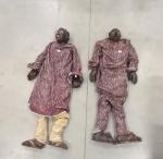 Deux mannequins en bois figurant un couple de béninois ,...