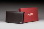 LANCEL - COMPAGNON en cuir marron. 11.5 x 20.5 cm....