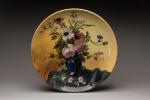 Opta Millet (1838-1911)
Plat rond en céramique polychrome à décor central...