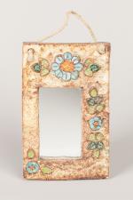 Vallauris attribué à La roue
Paire de miroirs de forme rectangulaire...