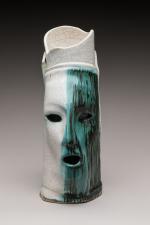 Le vase à deux têtes
Vase anthropomorphe en céramique blanche craquelée...