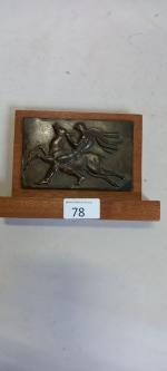 Robert Massard (1895-1955). Plaque en bronze à décor d'Hercule attrapant...