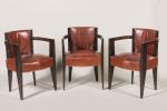 André Sornay (1902-2000)
Ensemble de huit fauteuils en palissandre de forme...