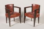 André Sornay (1902-2000)
Ensemble de huit fauteuils en palissandre de forme...