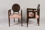 André Sornay (1902-2000)
Ensemble de quatre fauteuils à dossier rond en...