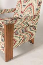 André Sornay (1902-2000)
Paire de fauteuils de salon capitonnés à montants...