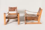 André Sornay (1902-2000)
Paire de fauteuils en bois clair à structure...