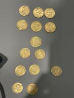 Ensemble de 14 pièces en or dont:
3 pièces 20 francs...