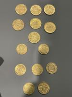 Ensemble de 14 pièces en or dont:
3 pièces 20 francs...