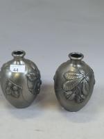 F. CORTESI ( XXème siècle), paire de vases en étain...