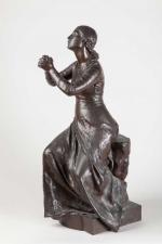 Paul DUBOIS (1827-1905) « L'implorante ». Sujet en bronze à patine médaille....
