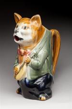 Orchies
Pichet en céramique polychrome à décor de chat musicien. Oreille...