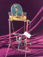 Jouet mécanique en tôle polychrome "Made in Germany" petit acrobate...