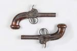 Paire de pistolets "coup de poing" milieu XIXe siècle, chiens...